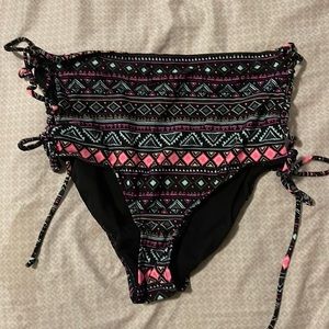 Charlotte Russe bikini bottom, lace up side. Geographic pattern. Size L.